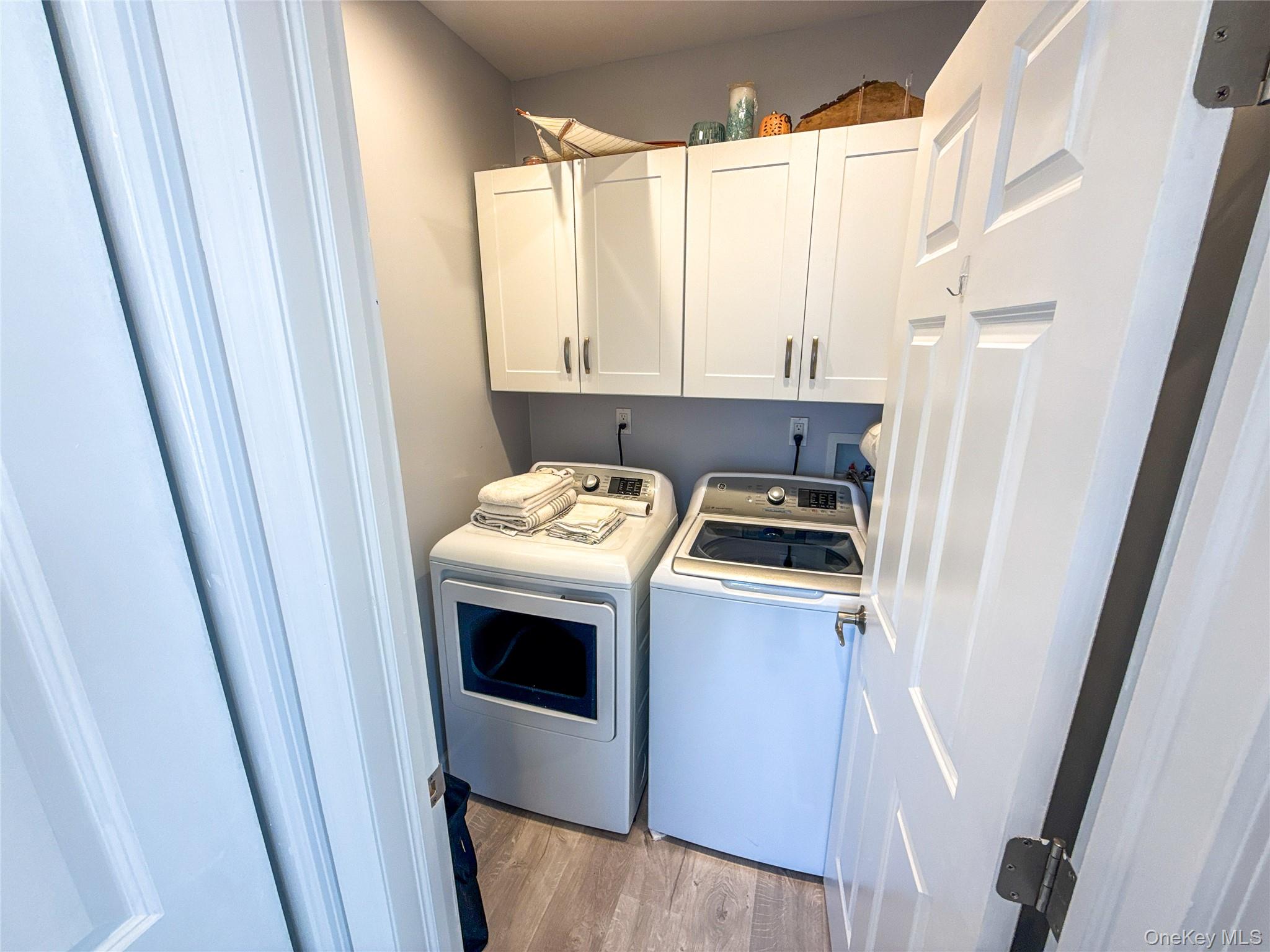 97 Cedarhurst Avenue Point Lookout, NY 11569 - Photo 18 of 21 a view of hallway with washer and dryer