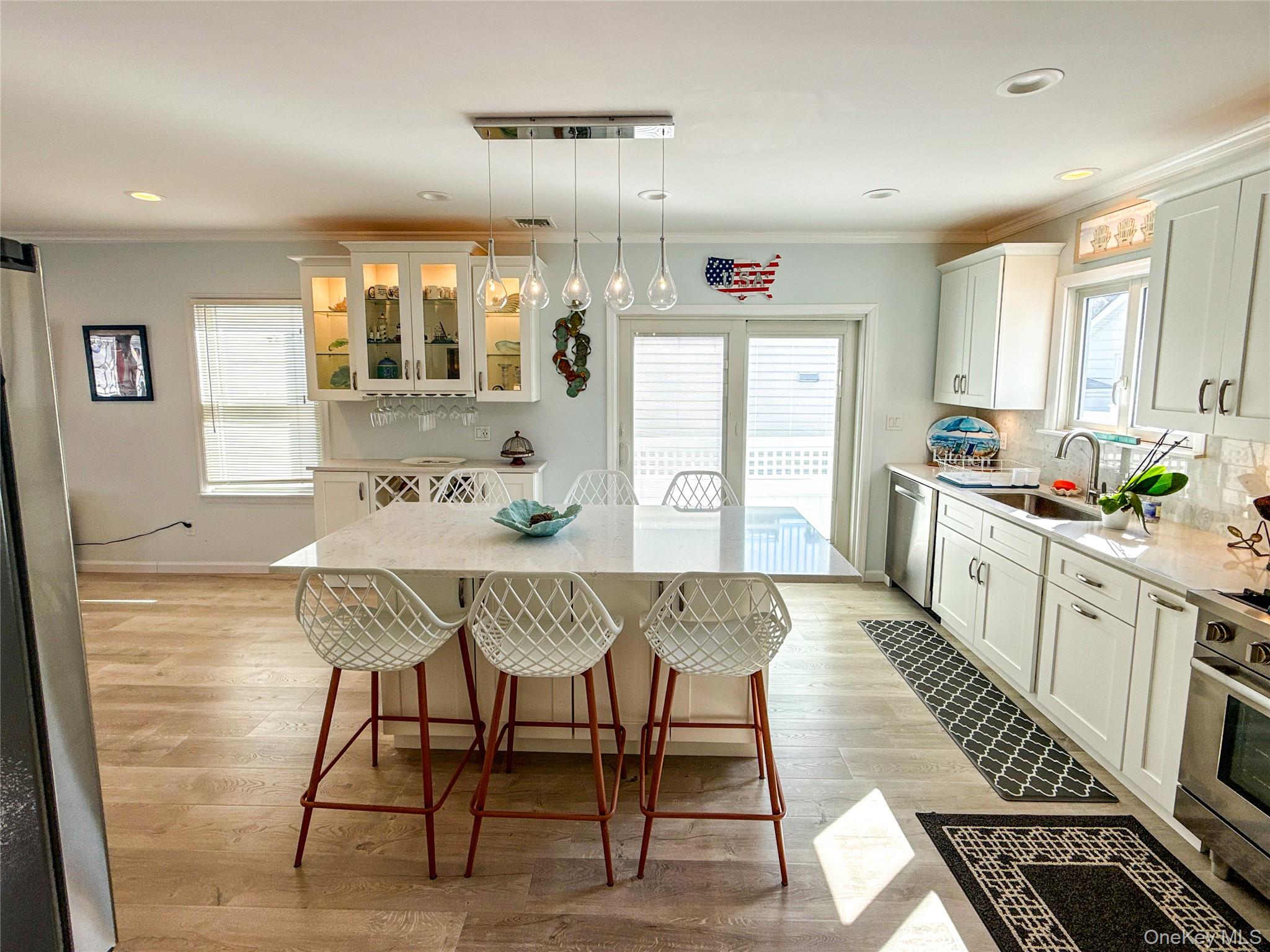 97 Cedarhurst Avenue Point Lookout, NY 11569 - Photo 8 of 21 a view of a dining room with furniture