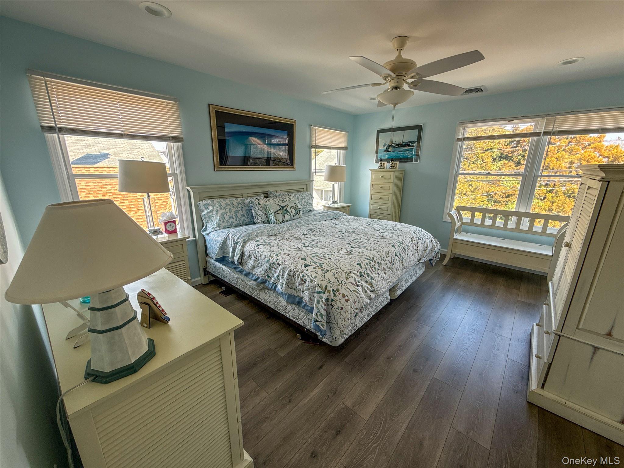 97 Cedarhurst Avenue Point Lookout, NY 11569 - Photo 10 of 21 a bedroom with a bed and wooden floor