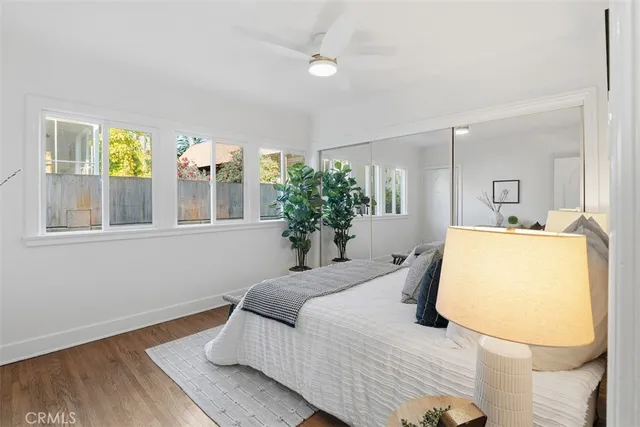 a bedroom with a bed and window