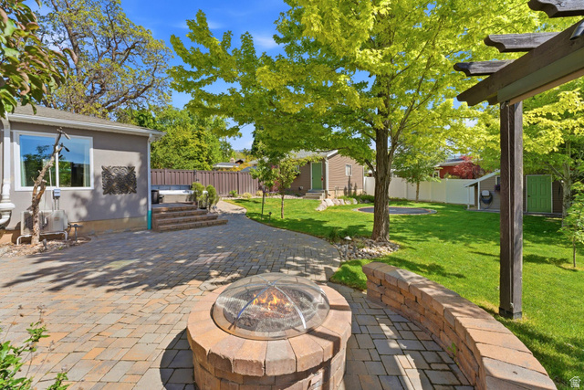 720 East Center Street Bountiful, UT 84010 - Photo 70 of 83 Flagstone Patio with Gas Fireplace