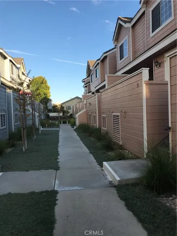 a view of a yard in front of a house
