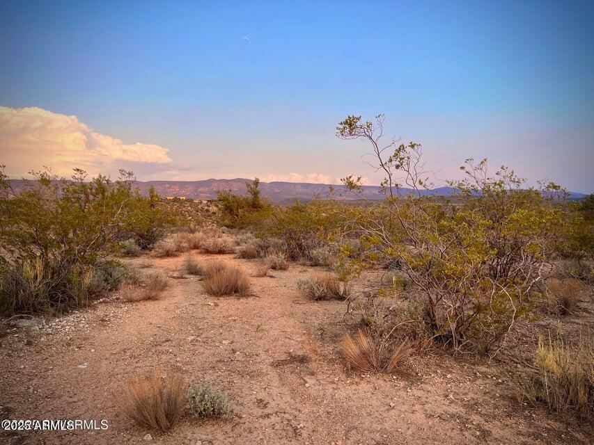 6295 North Mogollon Rim Lane, Unit 129 Rimrock, AZ 86335 - Photo 11 of 37 a view of a town with mountains in the background