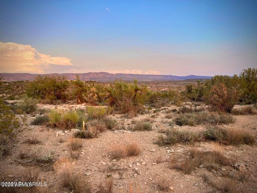 6295 North Mogollon Rim Lane, Unit 129 Rimrock, AZ 86335 - Photo 15 of 37 a view of a city with mountains in the background