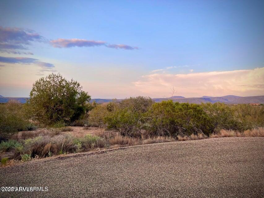 6295 North Mogollon Rim Lane, Unit 129 Rimrock, AZ 86335 - Photo 26 of 37 a view of a field with sunset