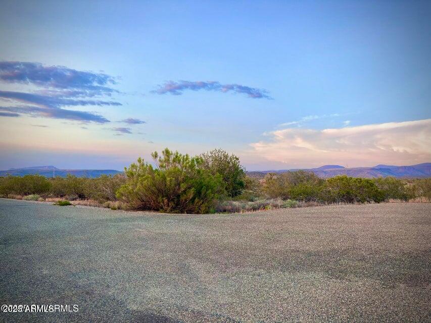 6295 North Mogollon Rim Lane, Unit 129 Rimrock, AZ 86335 - Photo 28 of 37 a view of lake with mountain in the background