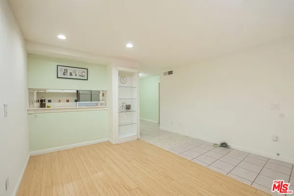a view of kitchen and wooden floor