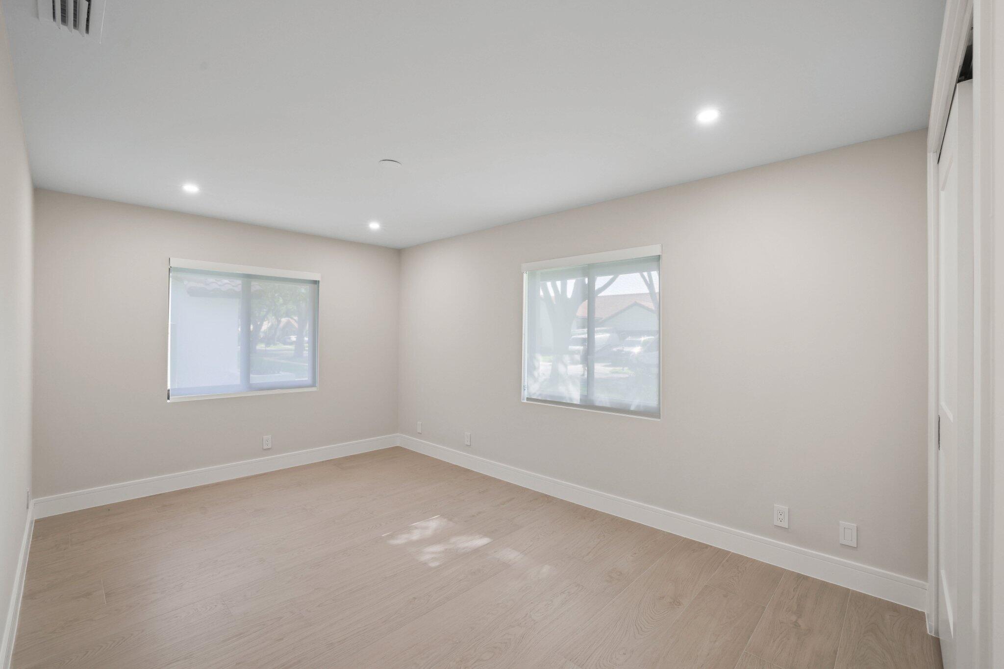 3901 Northwest 27th Avenue Boca Raton, FL 33434 - Photo 41 of 56 an empty room with windows