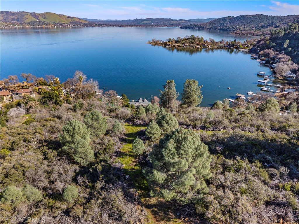 11390 Point Lakeview Road Lower Lake, CA 95457 - Photo 25 of 29 a view of a ocean with mountains in the background