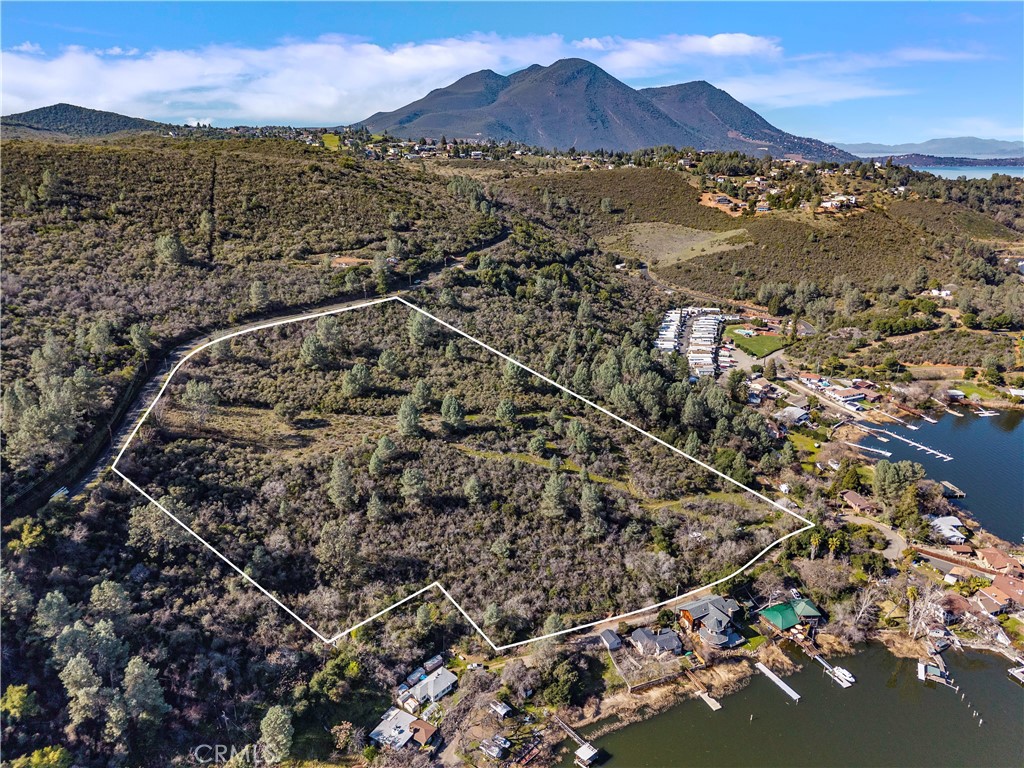 11390 Point Lakeview Road Lower Lake, CA 95457 - Photo 8 of 29 a view of a city with mountains in the background