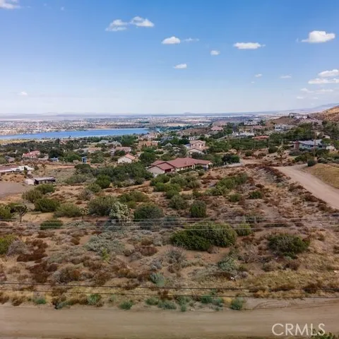 an aerial view of beach and ocean