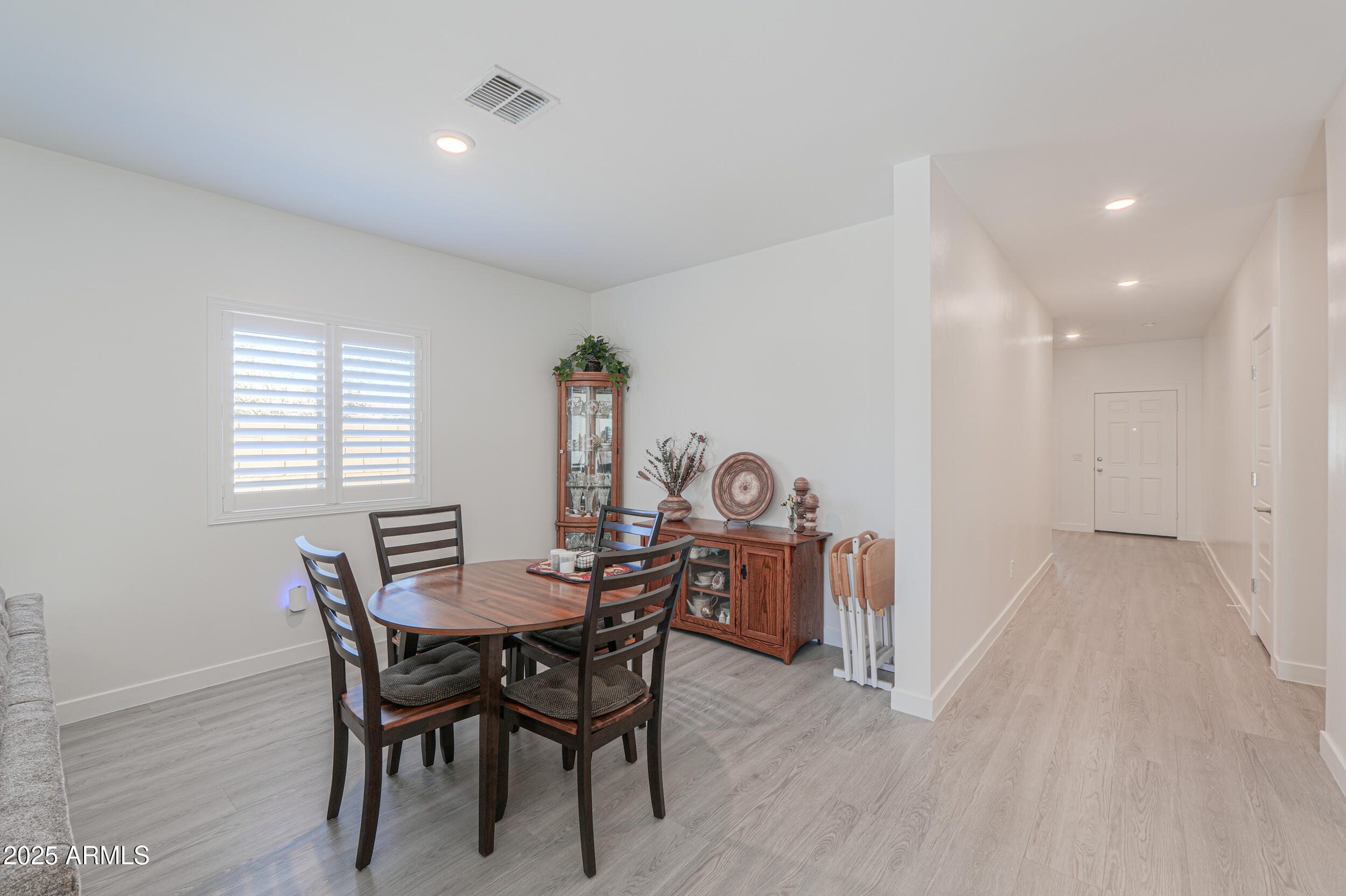 947 East Wiley Way Casa Grande, AZ 85122 - Photo 20 of 36 a view of a dining room with furniture and window