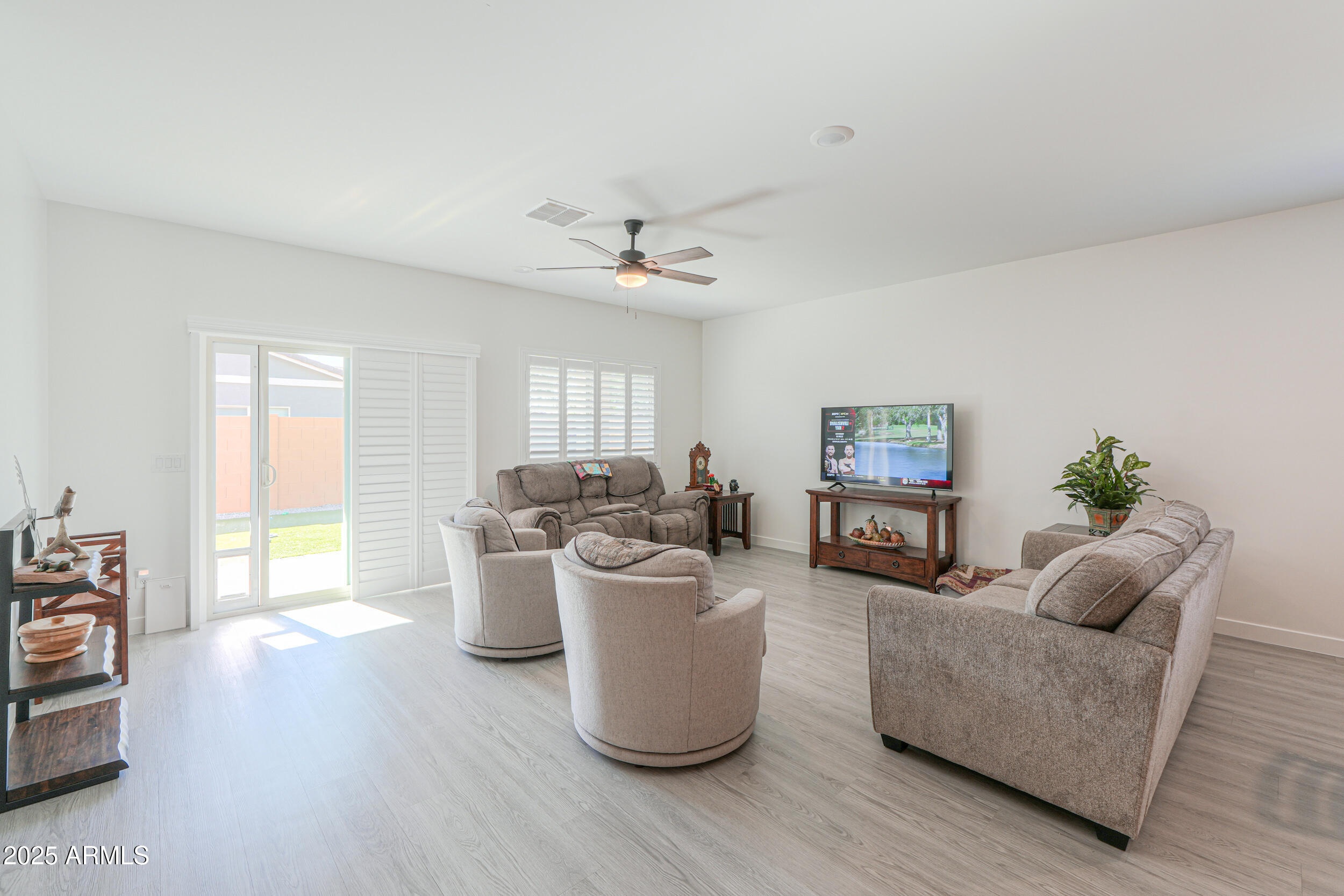 947 East Wiley Way Casa Grande, AZ 85122 - Photo 22 of 36 a living room with furniture and a large window