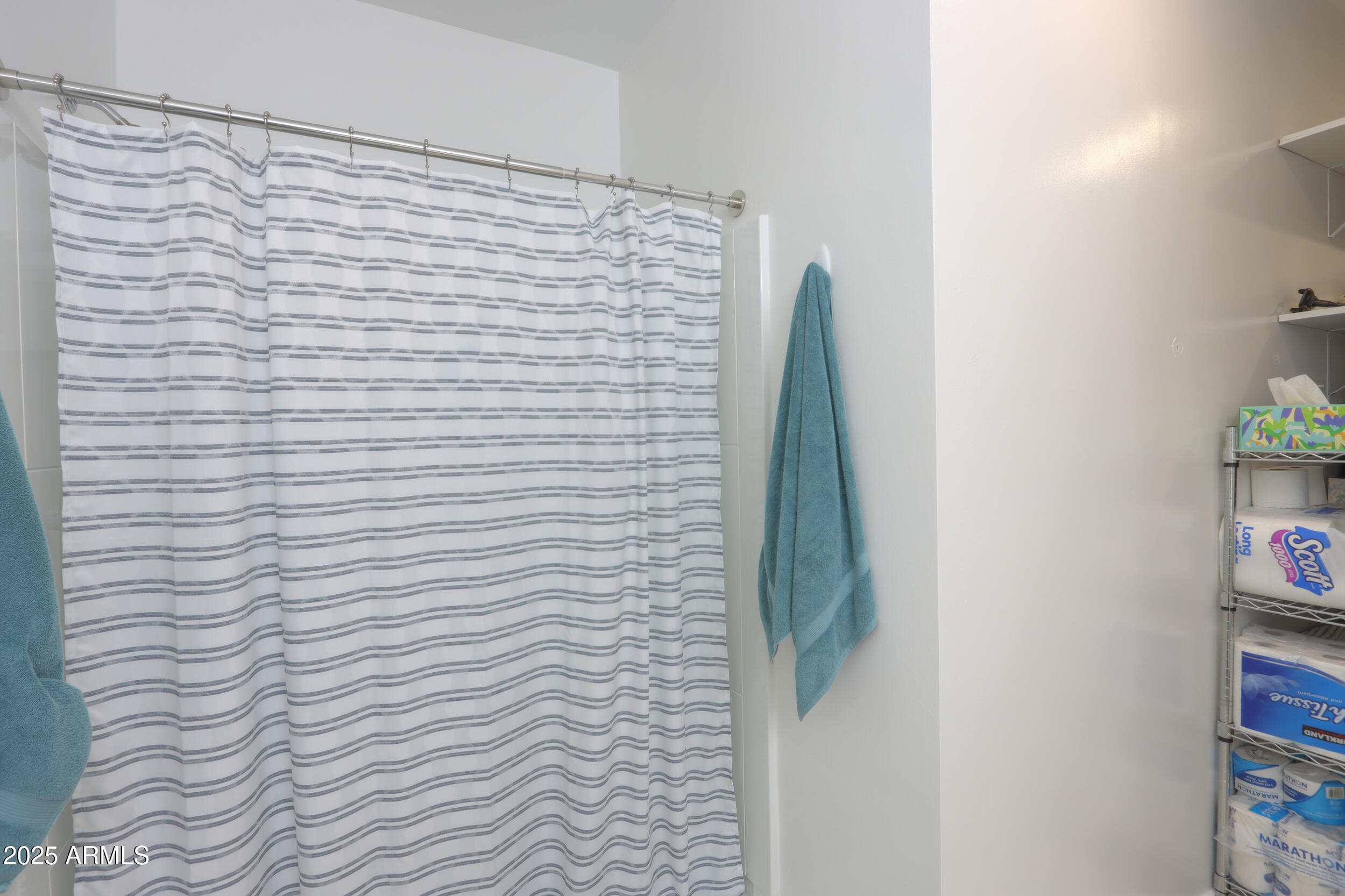 947 East Wiley Way Casa Grande, AZ 85122 - Photo 30 of 36 a bathroom with a shower