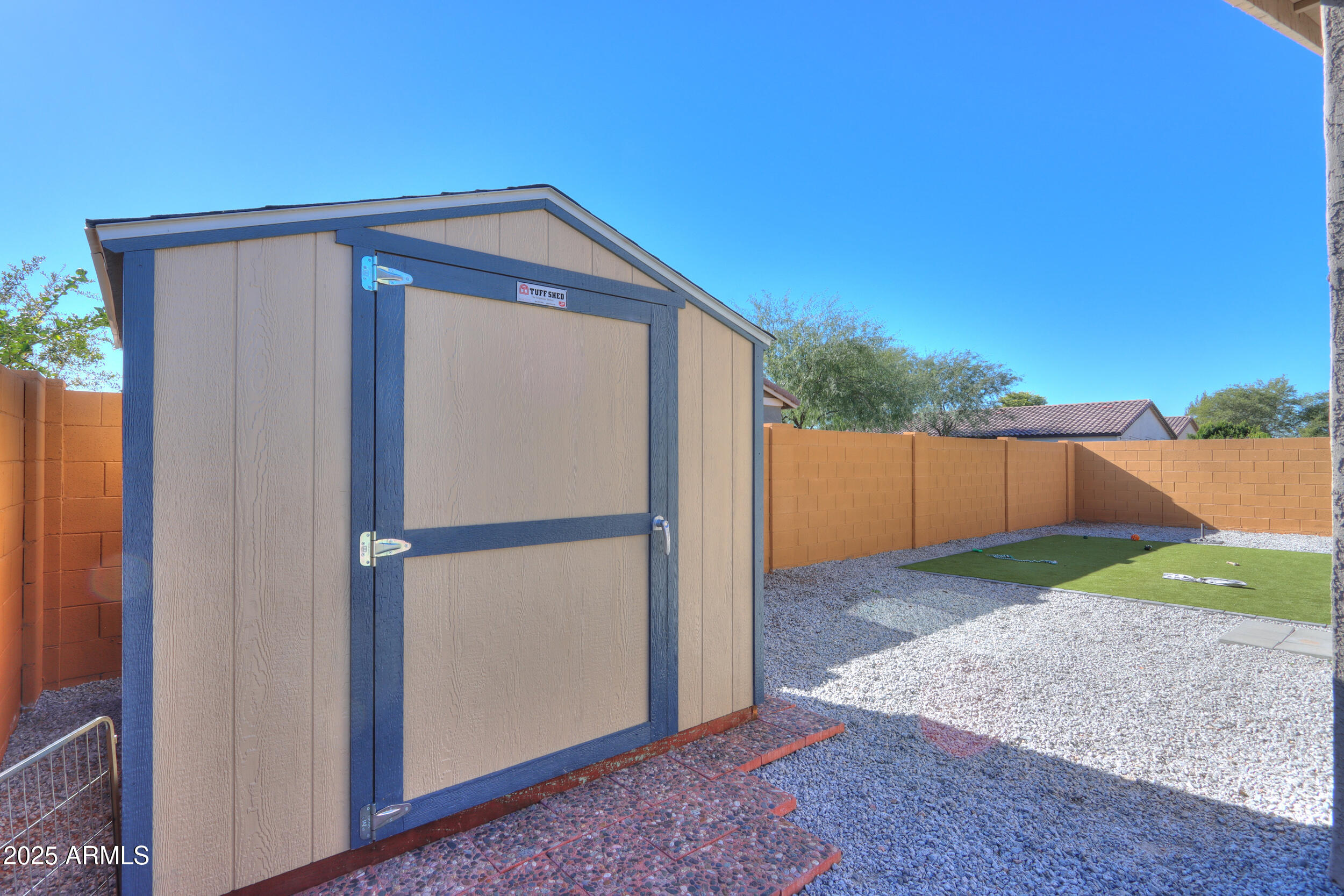 947 East Wiley Way Casa Grande, AZ 85122 - Photo 35 of 36 a view of backyard with small cabin