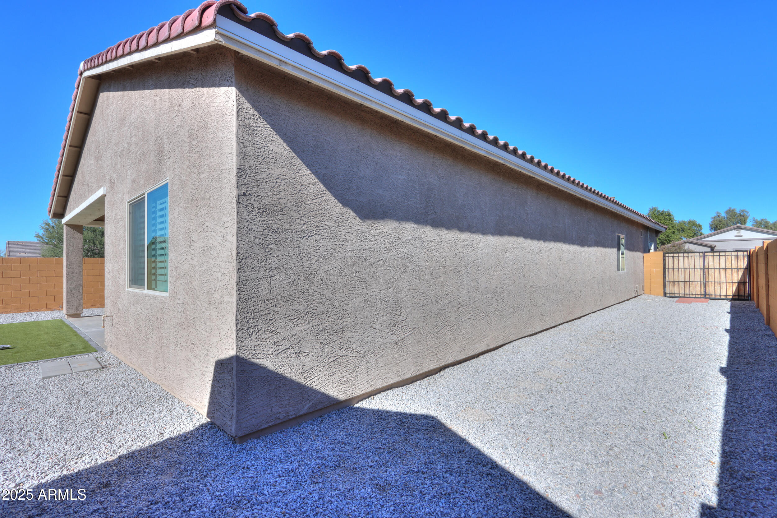 947 East Wiley Way Casa Grande, AZ 85122 - Photo 36 of 36 a tall building with a outdoor space
