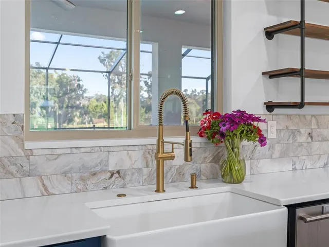 a bedroom with a bed a couch and dresser