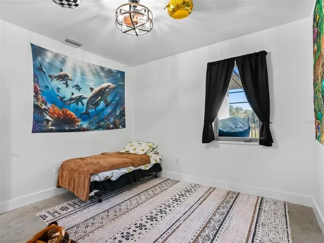 a workspace with furniture and a window