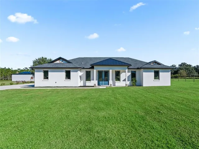 a view of livingroom with furniture and window