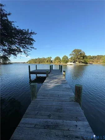 a wooden bridge near lake