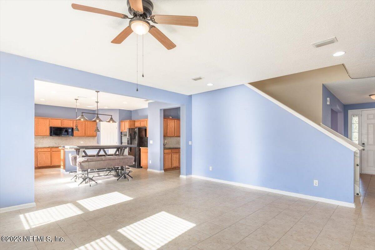 1415 Lantern Light Trail Middleburg, FL 32068 - Photo 16 of 63 Living Room to Kitchen