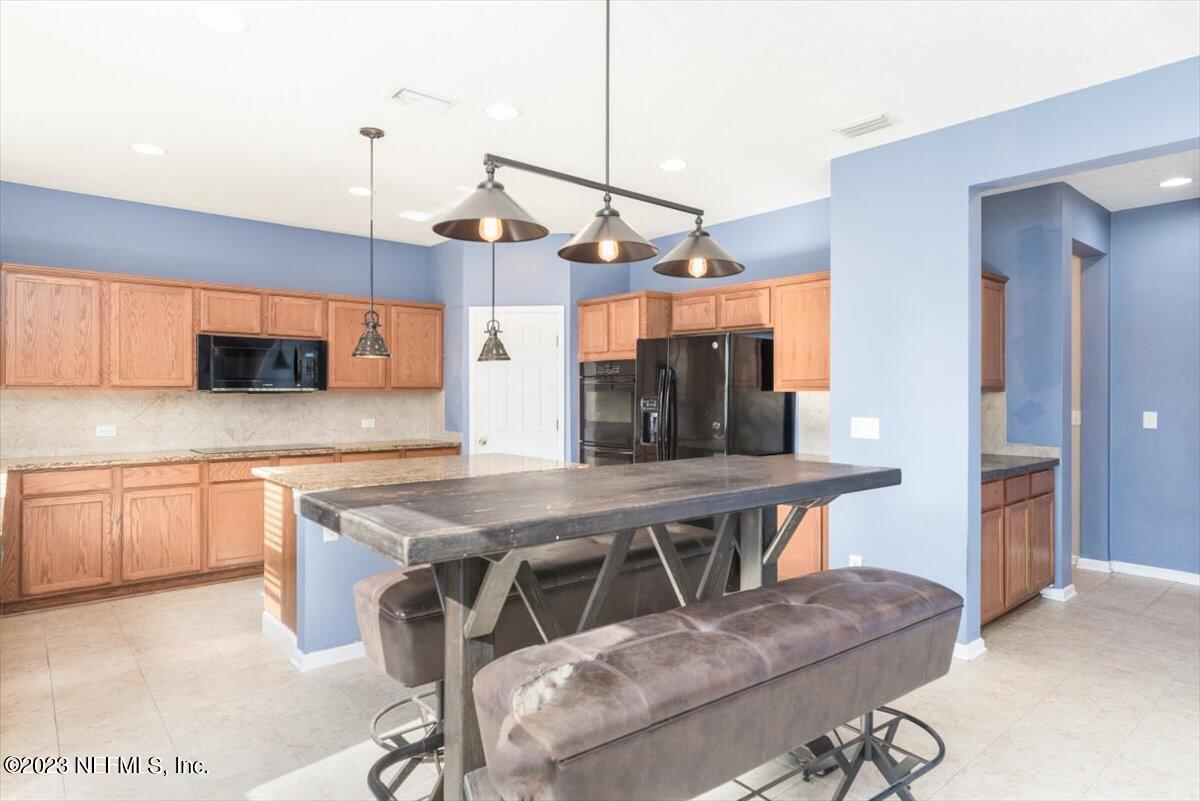 1415 Lantern Light Trail Middleburg, FL 32068 - Photo 22 of 63 Kitchen to Breakfast Area