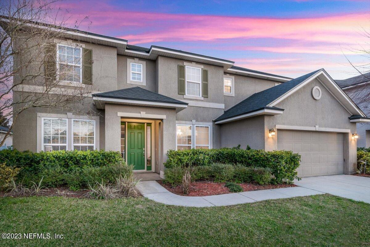 1415 Lantern Light Trail Middleburg, FL 32068 - Photo 3 of 63 Front Exterior Angled Twilight