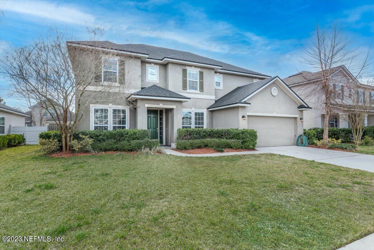 1415 Lantern Light Trail Middleburg, FL 32068 - Photo 5 of 63 Front of Home Angled