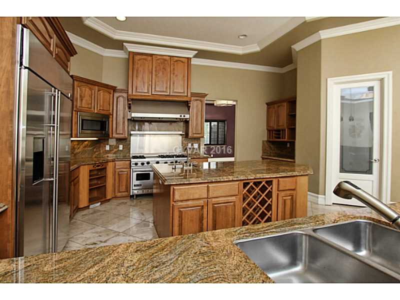 8012 Spring Buck Court Las Vegas, NV 89129 - Photo 11 of 33 Kitchen.