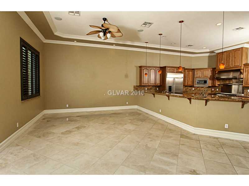 8012 Spring Buck Court Las Vegas, NV 89129 - Photo 7 of 33 Living Room.
