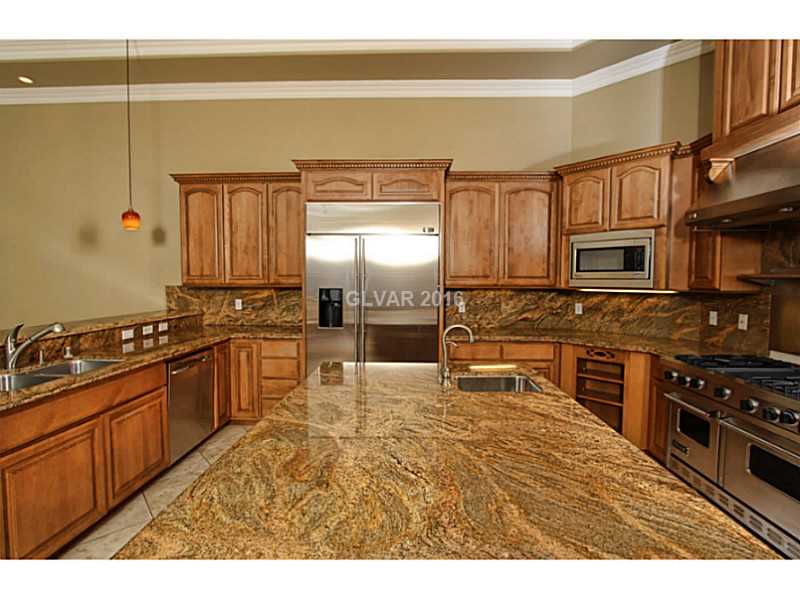 8012 Spring Buck Court Las Vegas, NV 89129 - Photo 9 of 33 Kitchen.