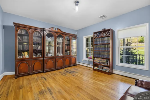 a view of a bedroom with furniture window and outside view