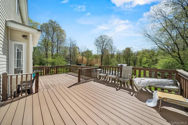 a view of balcony with furniture