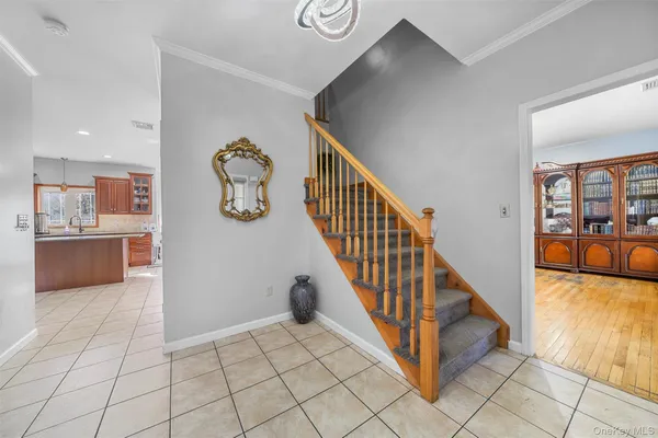 a view of a hallway with staircase