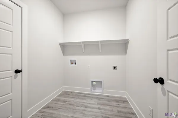 $303,900 | 7300 Brook Hollow Drive, Zachary, LA 70791