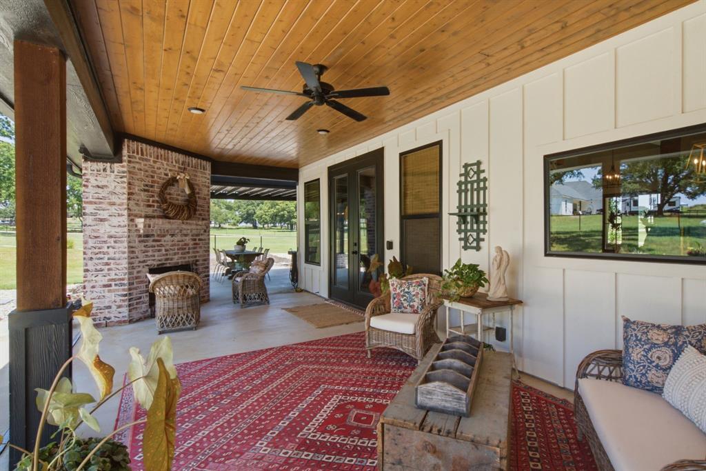 200 Greene Road Wilmer, TX 75172 - Photo 34 of 40 a living room with furniture and a fireplace
