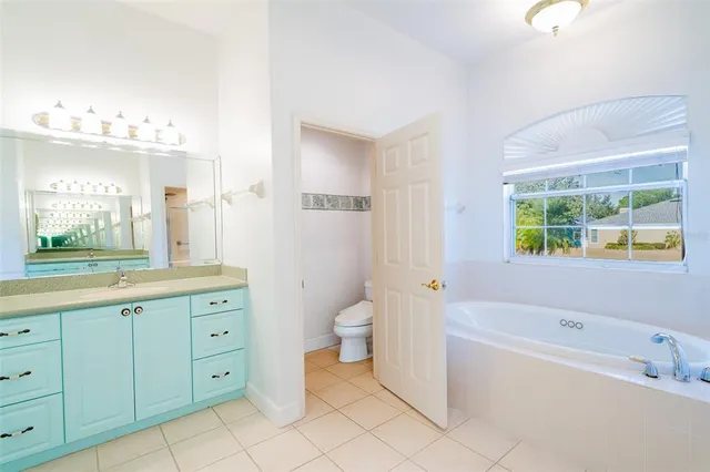 a bathroom with a bathtub sink and toilet