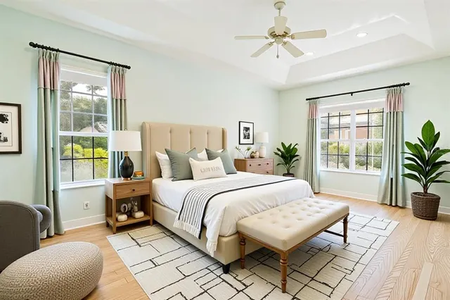 a bedroom with a bed couch and window