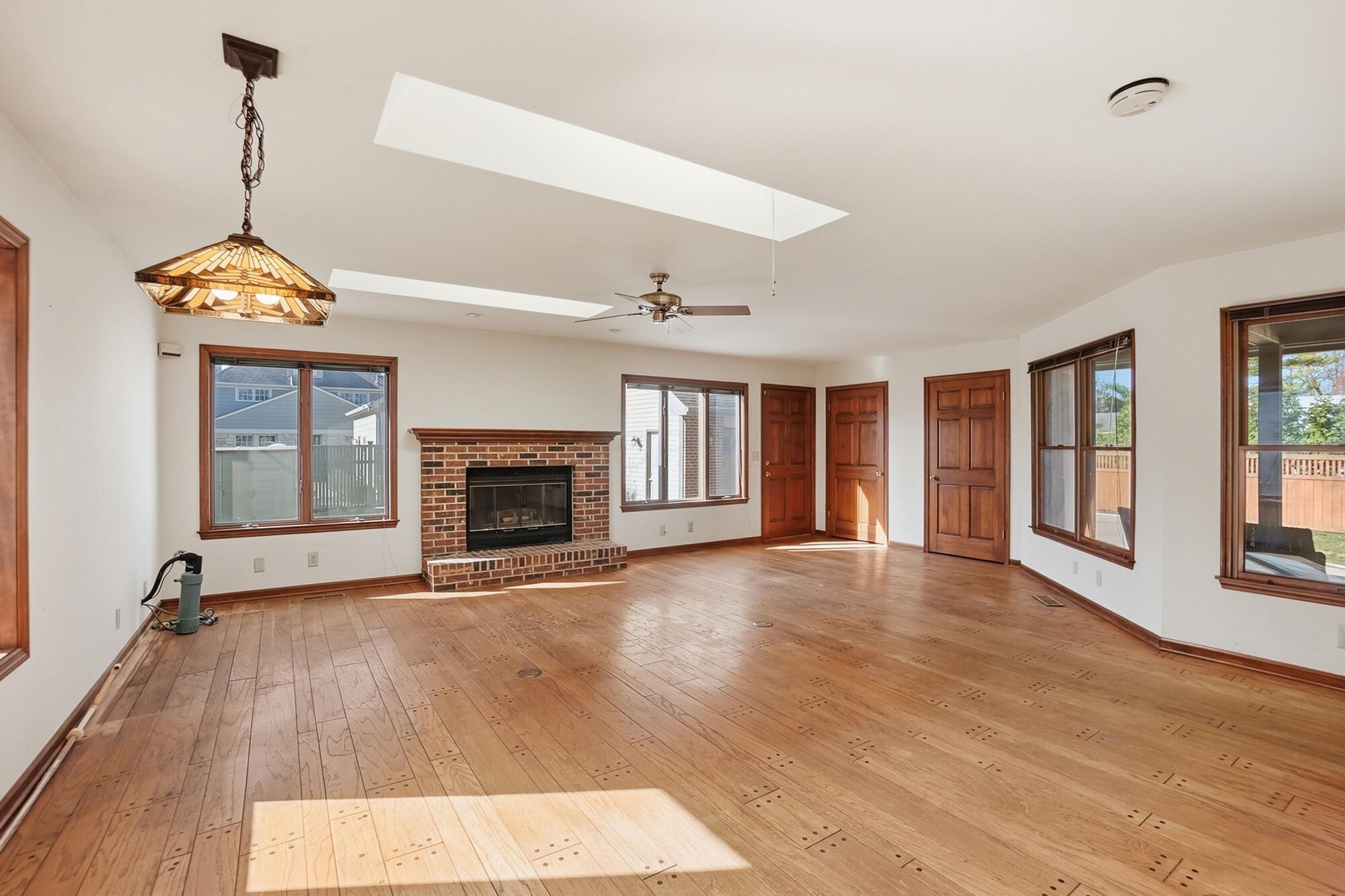 1627 Doone Road Upper Arlington, OH 43221 - Photo 24 of 37 This room features 2 large closets, a gas log fireplace, hardwood floors, natural light and it opens to the backyard and patio.
