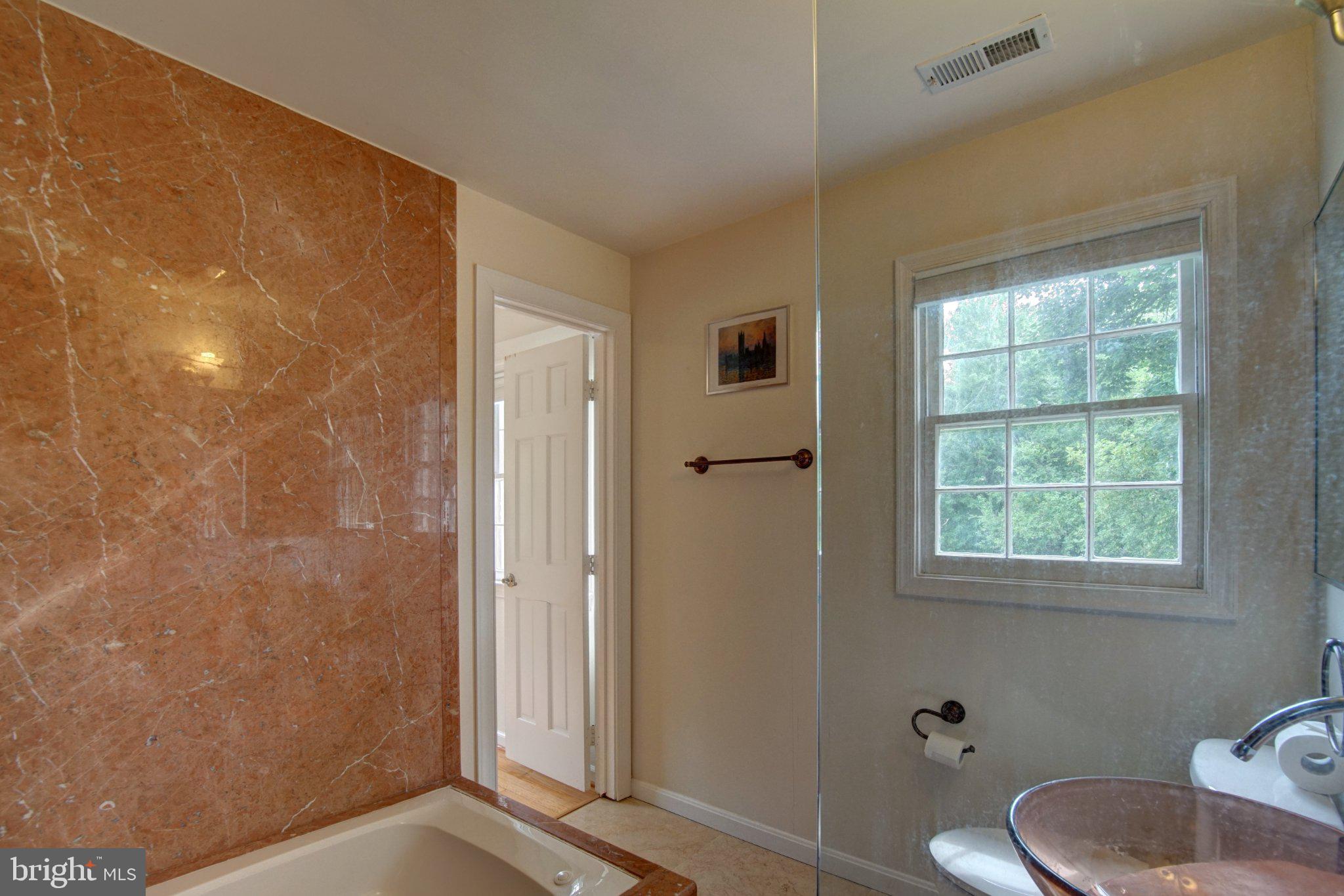 900 Walker Road Great Falls, VA 22066 - Photo 25 of 52 Elegant bathroom with marble accents.