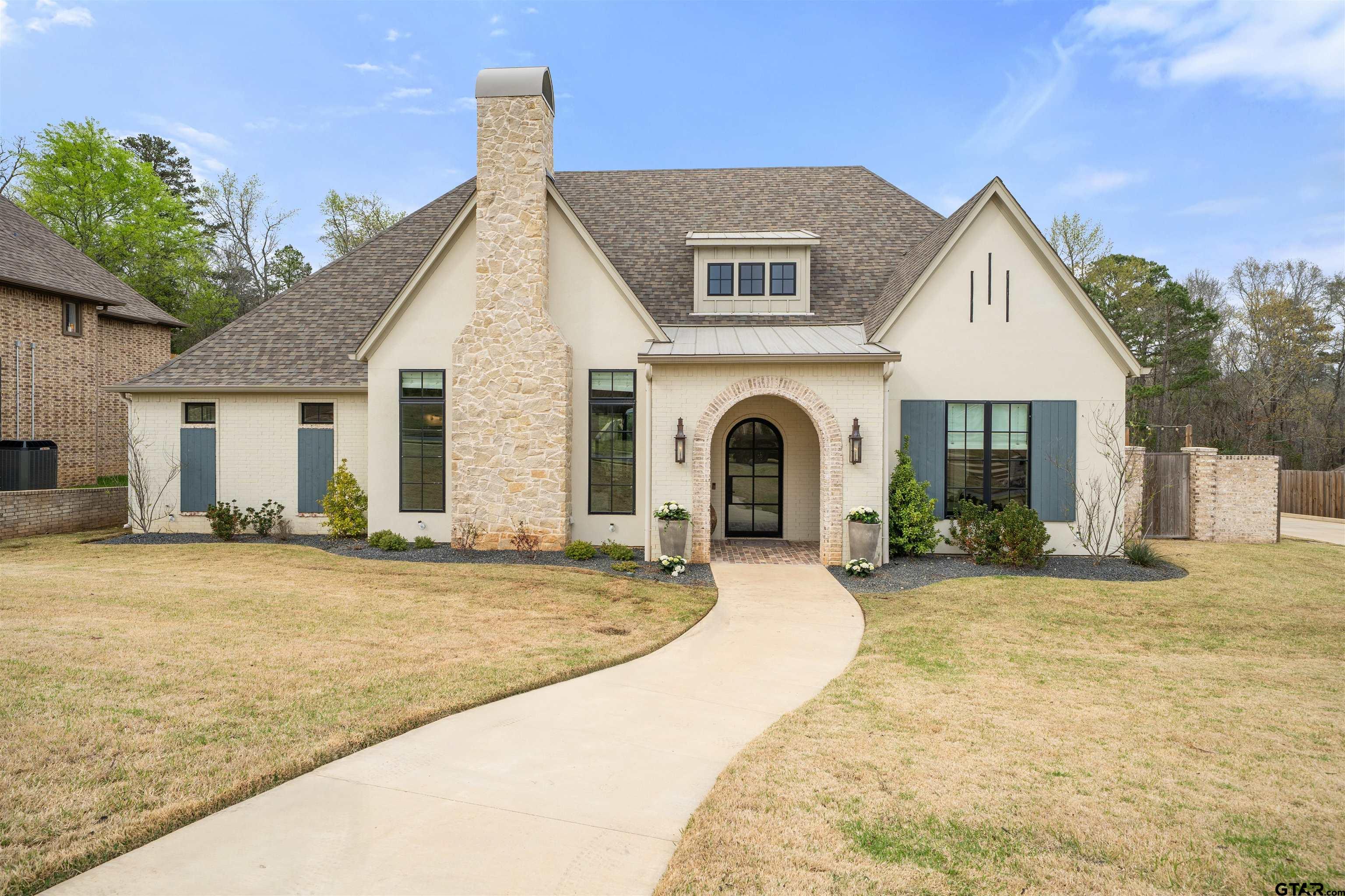 1555 Chaparrel Run Tyler, TX 75703 - Photo 1 of 48 a view of a house with yard and a tree