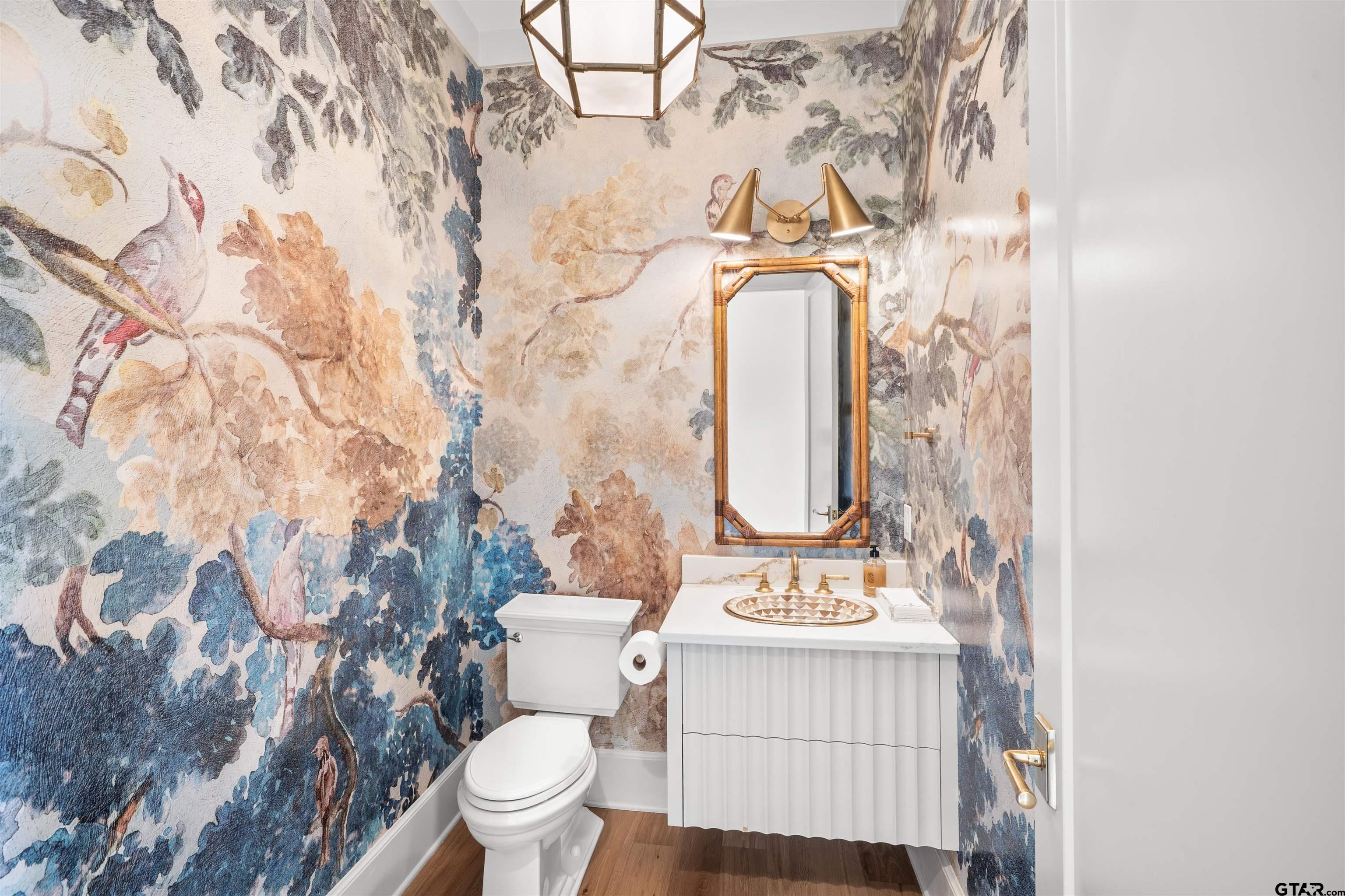 1555 Chaparrel Run Tyler, TX 75703 - Photo 26 of 48 a bathroom with a sink toilet and shower