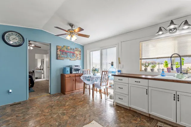 a bed room with a bed and a book shelf