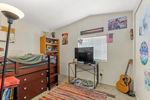 a view of a workspace with furniture