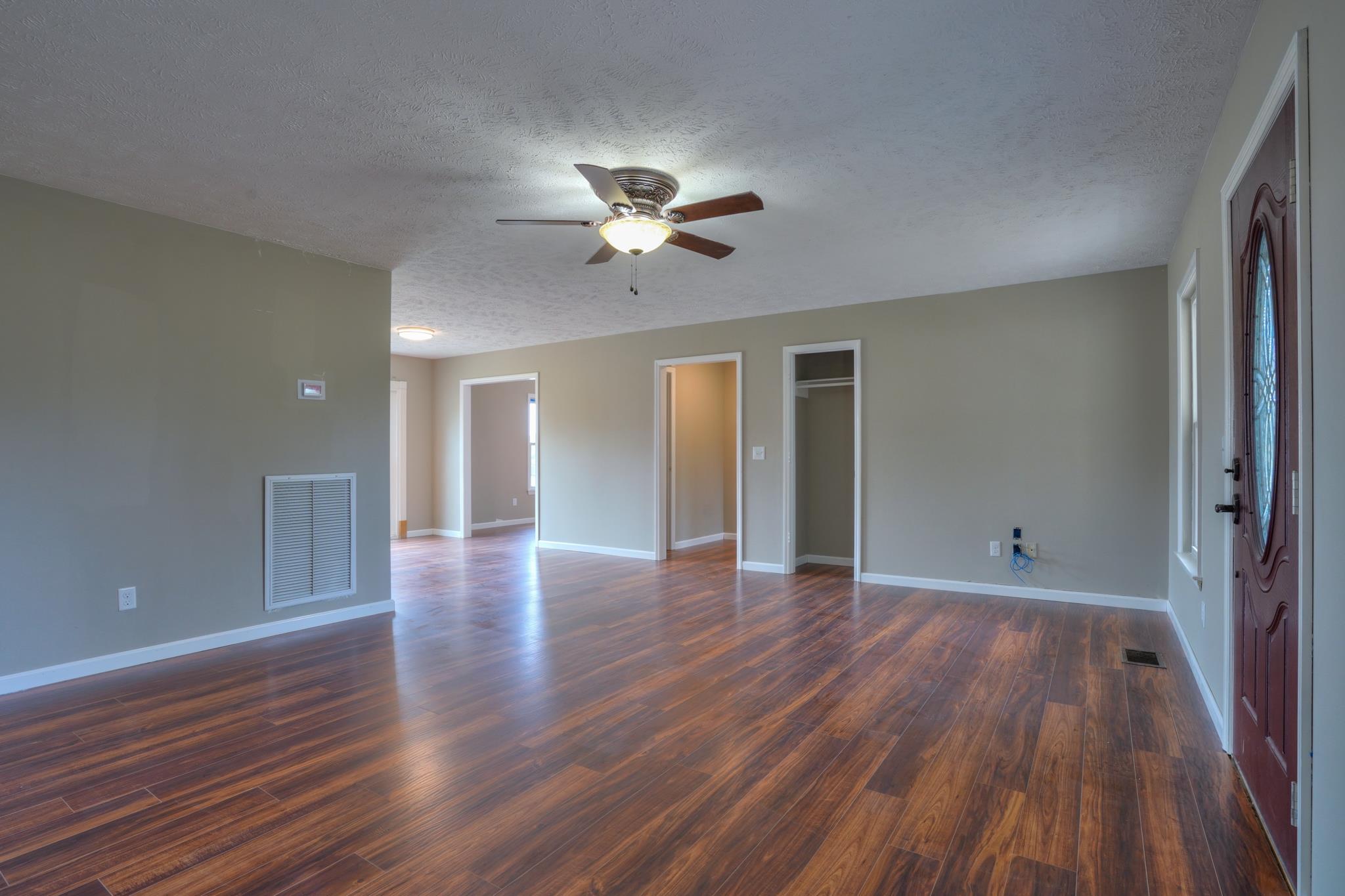 612 Murrell Road Dickson, TN 37055 - Photo 4 of 29 wooden floor in an empty room with a window