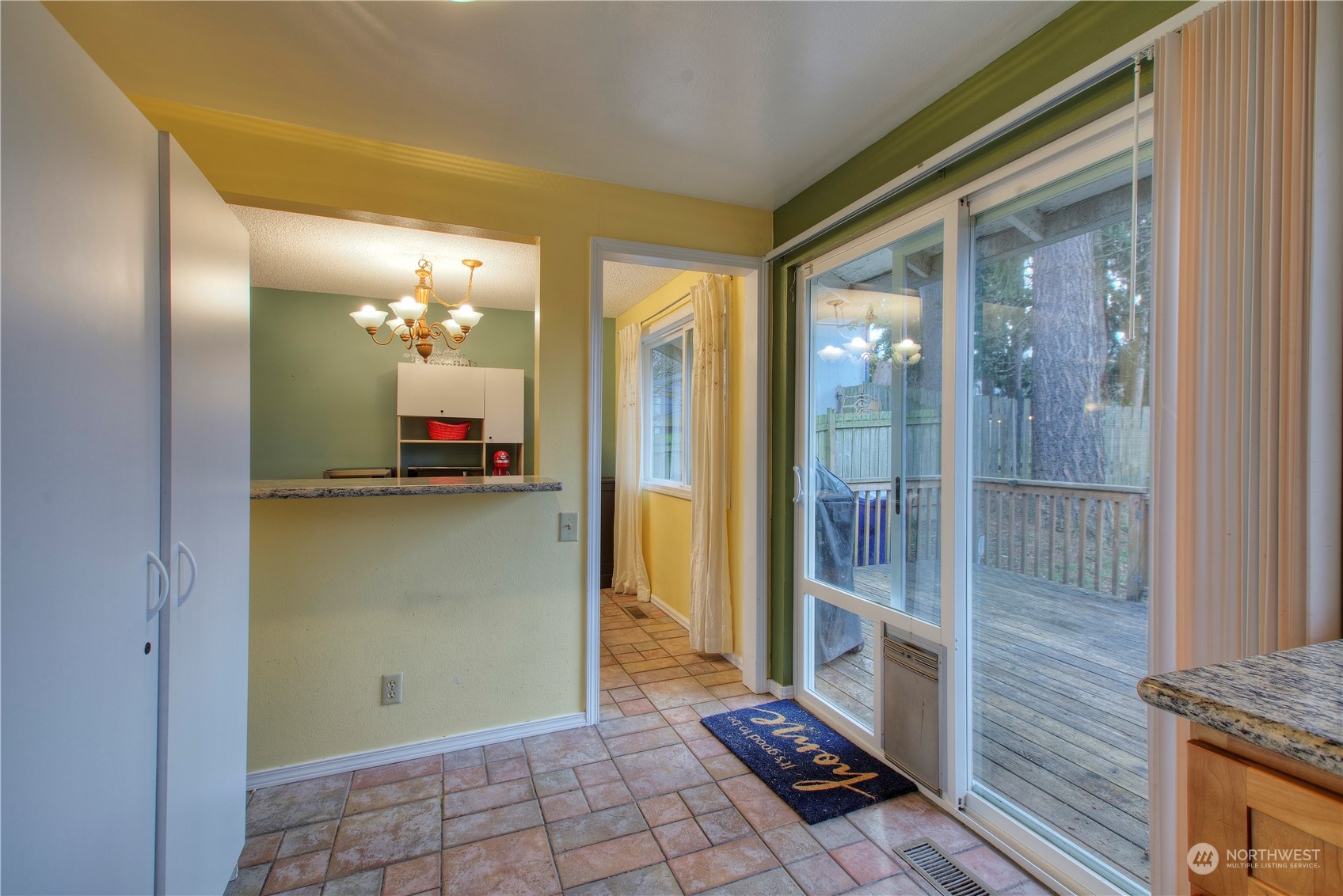 32607 35th Avenue Southwest Federal Way, WA 98023 - Photo 12 of 24 a view of a hallway with wooden floor and a bathroom