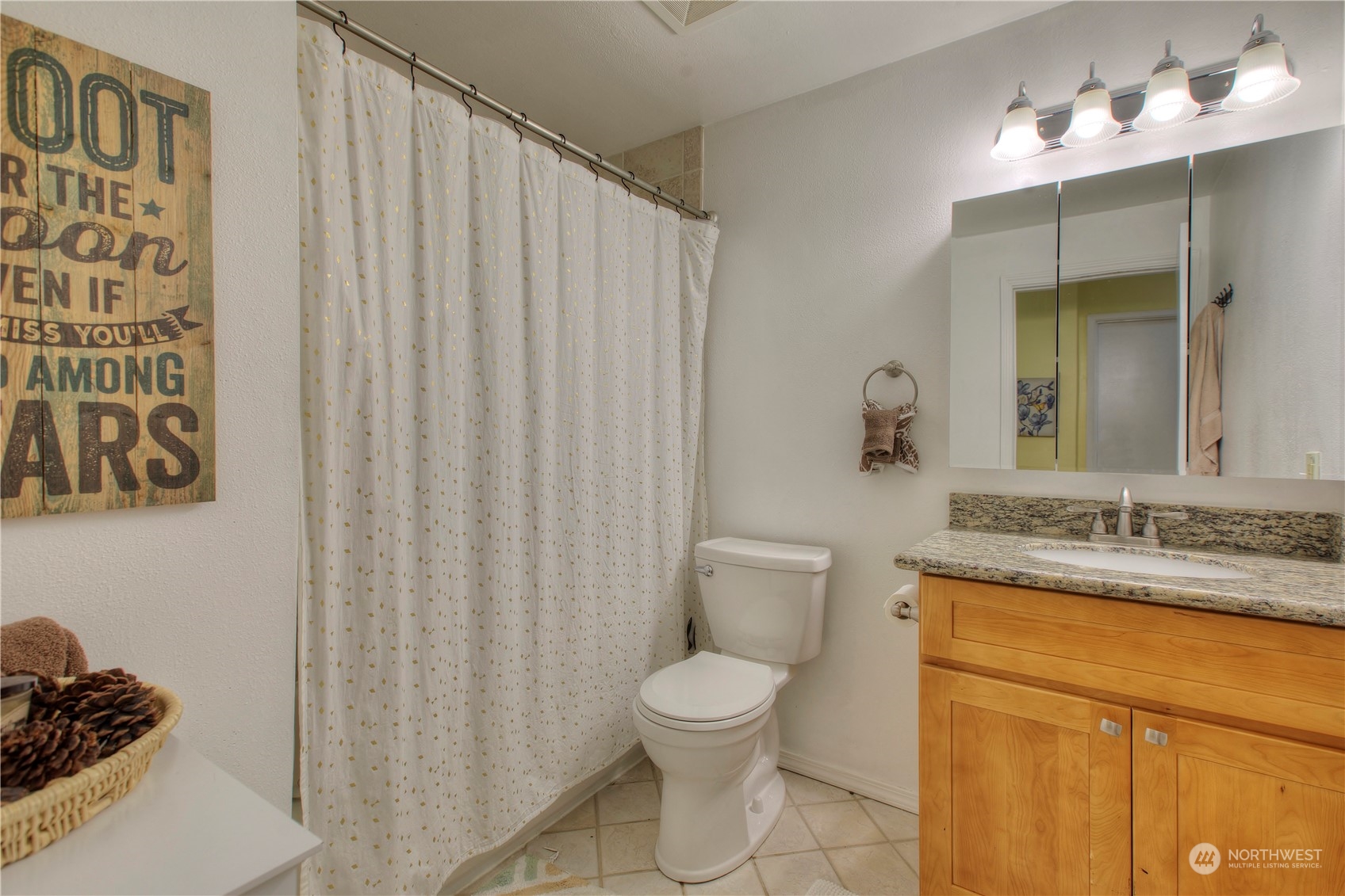 32607 35th Avenue Southwest Federal Way, WA 98023 - Photo 19 of 24 a bathroom with a granite countertop sink toilet and mirror