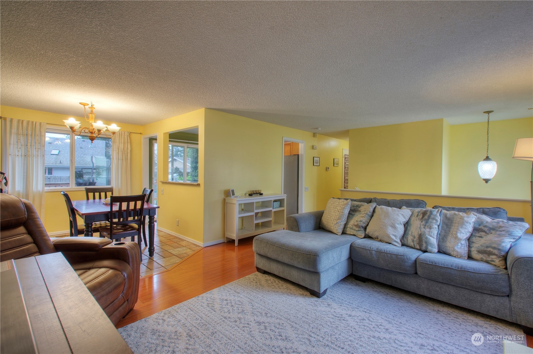 32607 35th Avenue Southwest Federal Way, WA 98023 - Photo 4 of 24 a living room with furniture and a couch