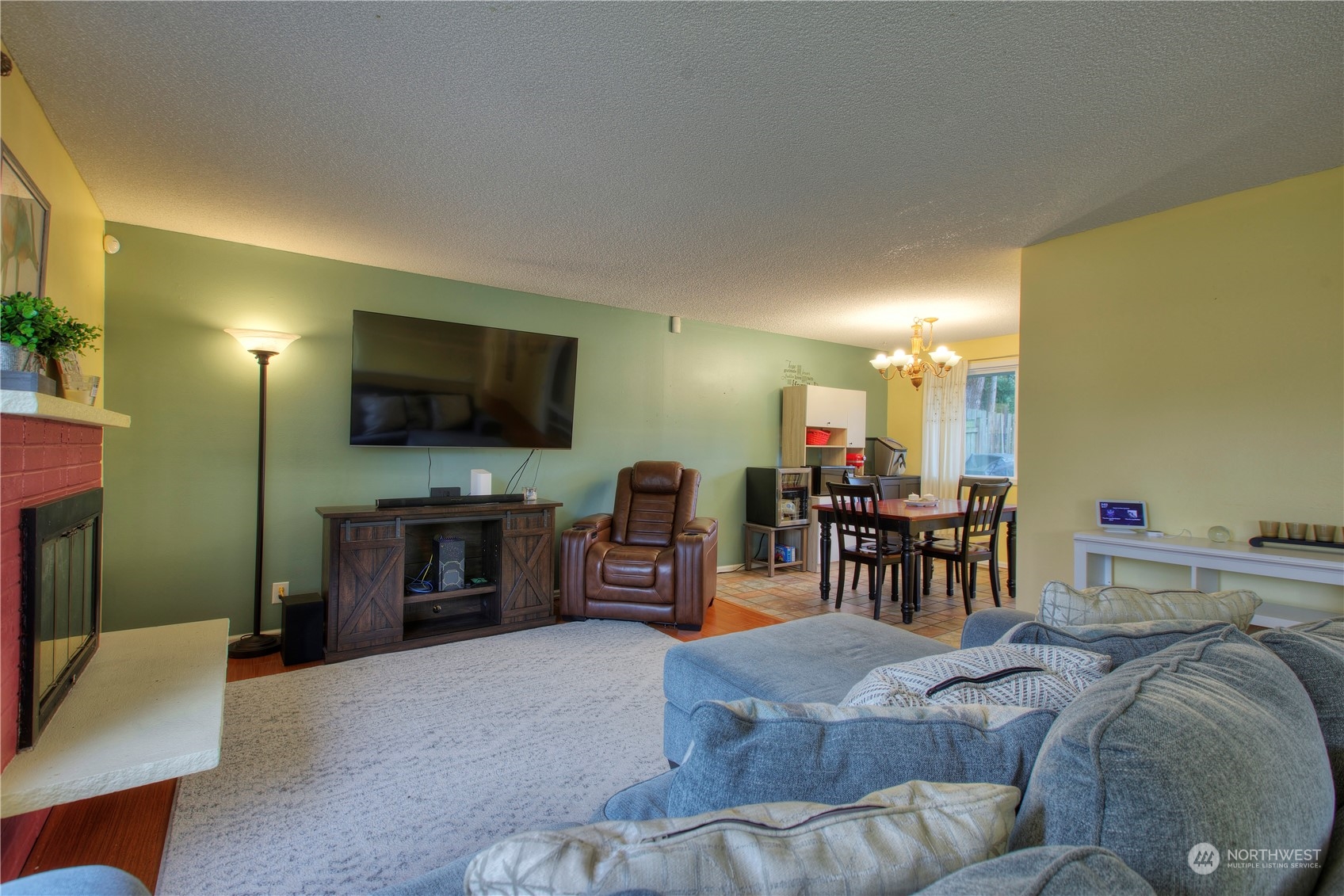 32607 35th Avenue Southwest Federal Way, WA 98023 - Photo 5 of 24 a living room with furniture and a flat screen tv