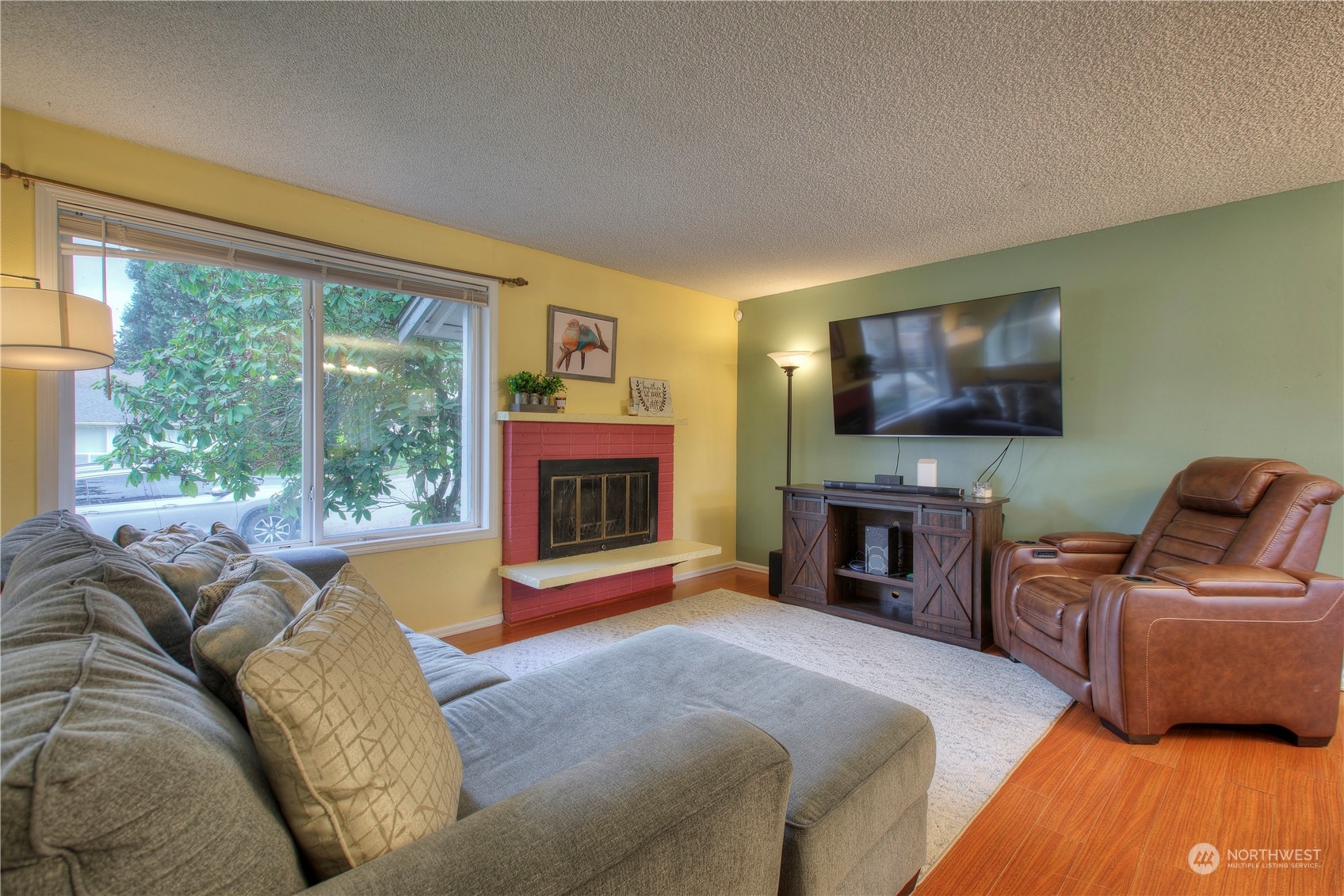 32607 35th Avenue Southwest Federal Way, WA 98023 - Photo 6 of 24 a living room with furniture and a flat screen tv